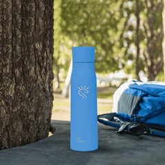 blue SmartFlask smart water bottle outdoors