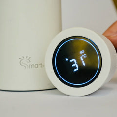 White smart flask lid showing 31°C temperature display