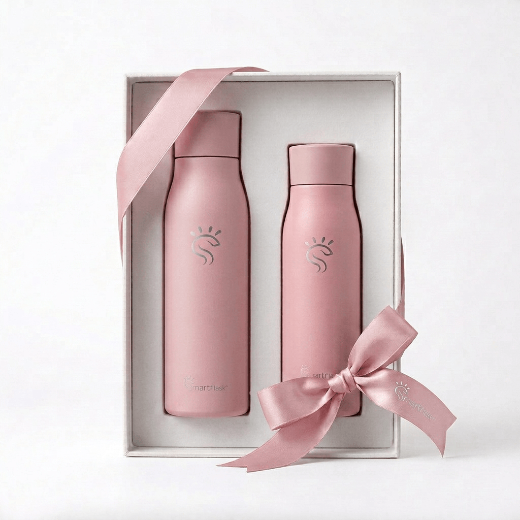 Rose pink Smart Flask UV self-cleaning bottle with LED UV-C light, 750 ml capacity, designed for portable, hygienic hydration.
